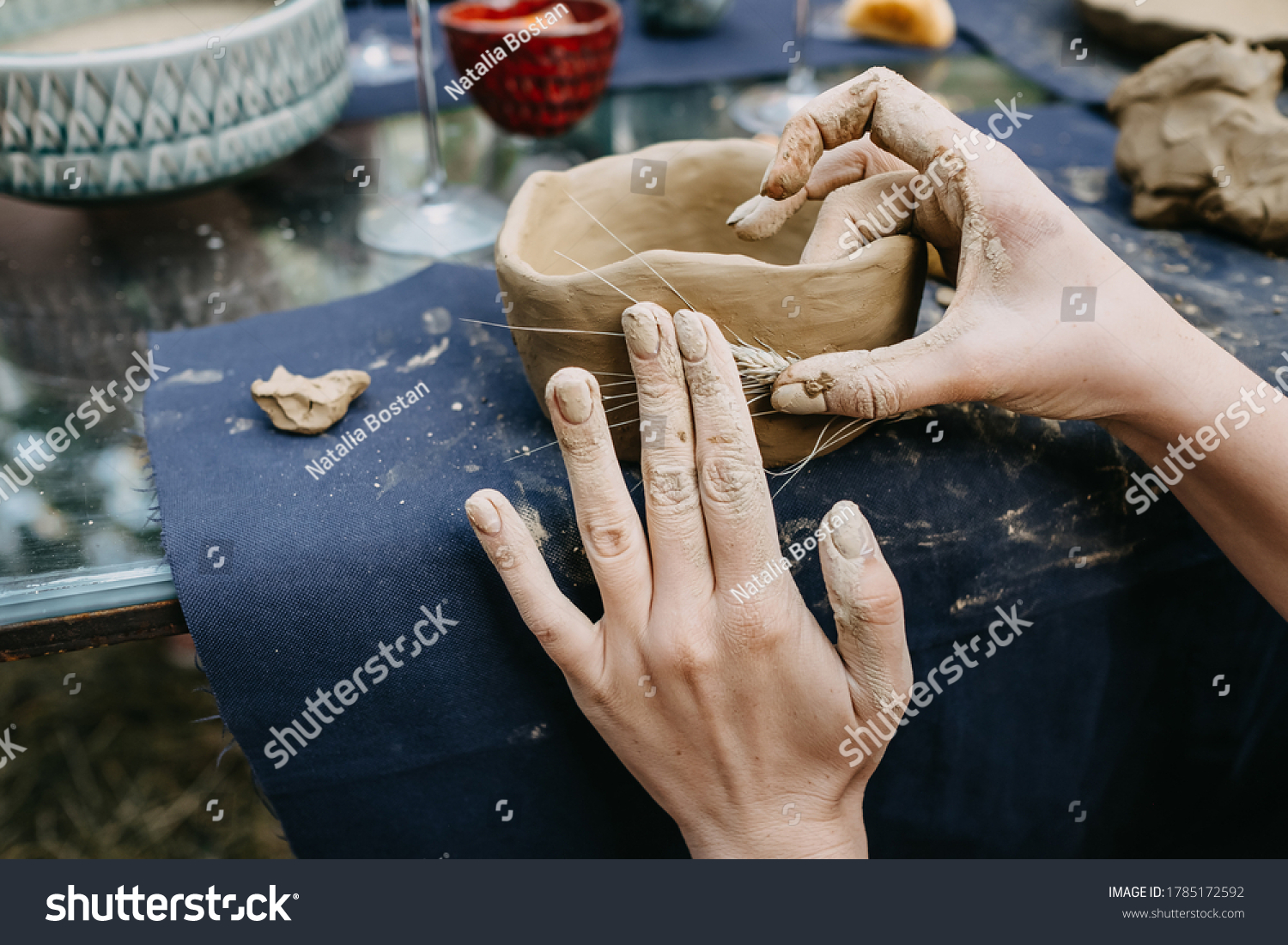 making a clay bowl by hand