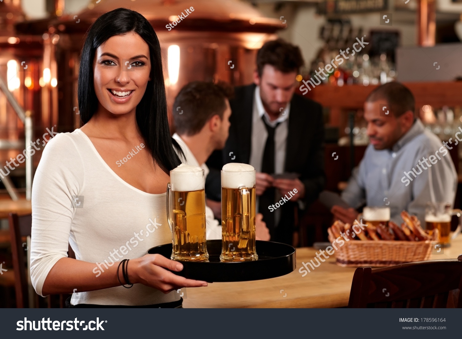 Portrait Happy Young Woman Serving Beer Stock Photo 178596164 ...