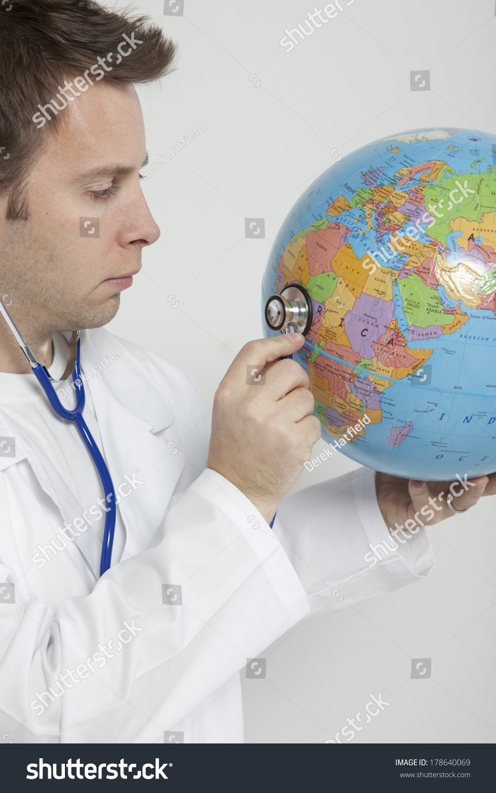 Doctor Holding Globe Stock Photo 178640069 | Shutterstock