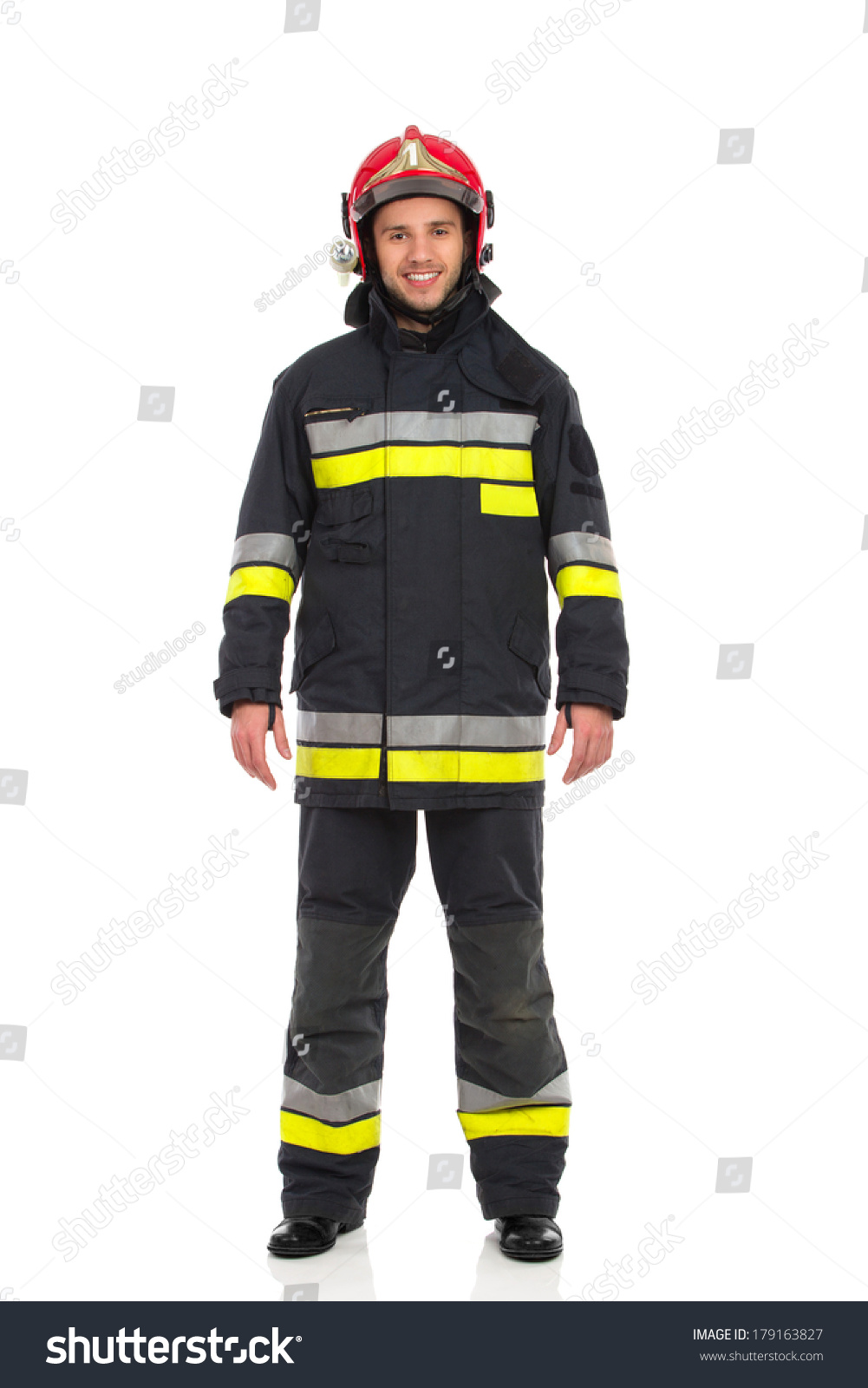 Smiling Firefighter Posing Front View Full Stock Photo 179163827 ...