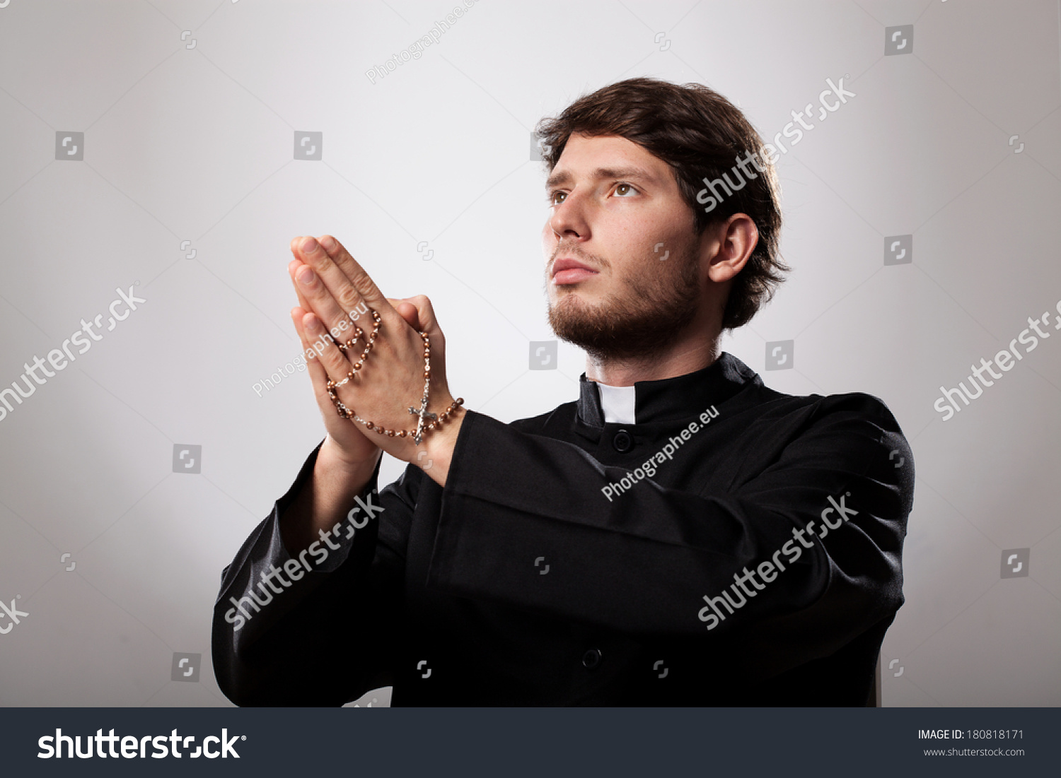 Young Christian Priest Praying Rosary Stock Photo 180818171 | Shutterstock