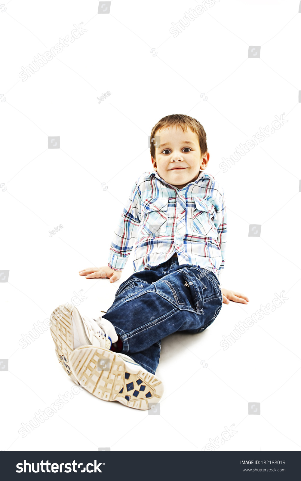 Smiling Little Boy Sitting Down On Stock Photo 182188019 | Shutterstock