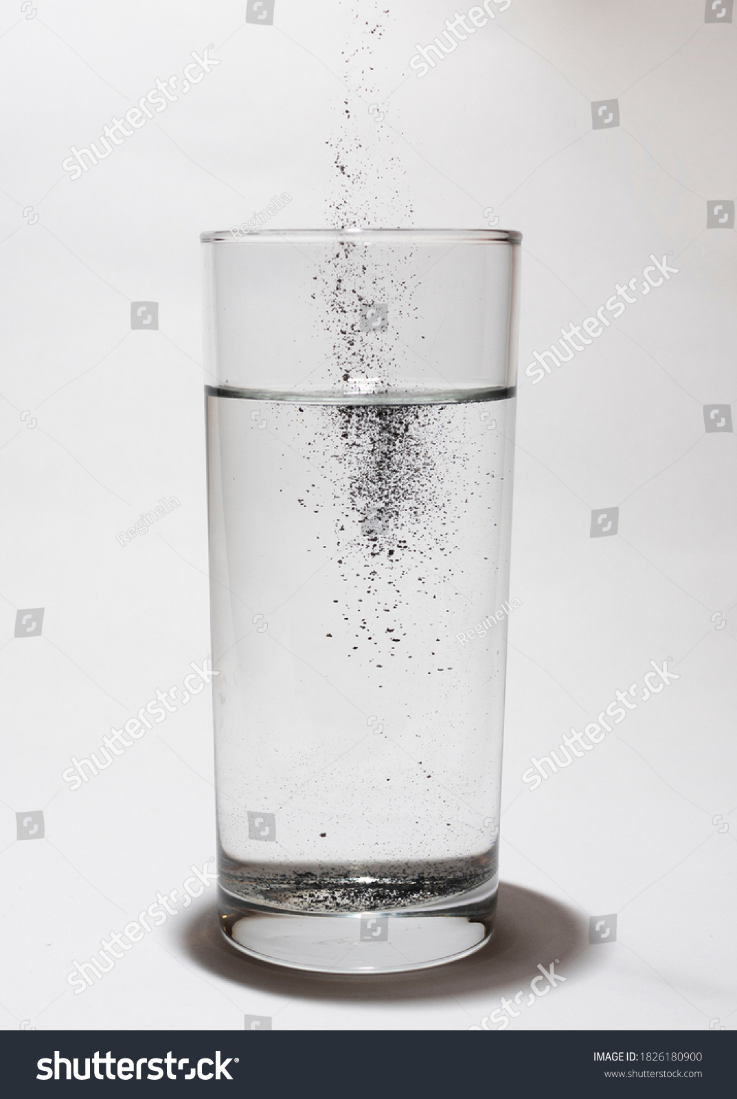 Glass Water Contaminated By Black Powder Stock Photo 1826180900 ...