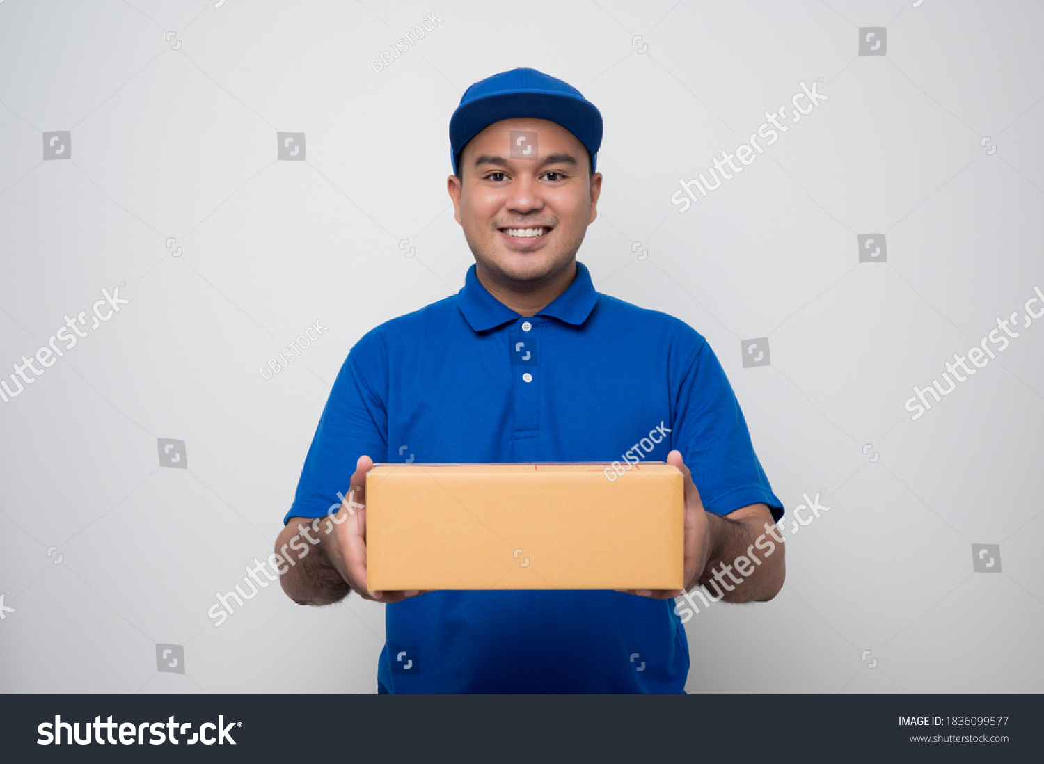 Young Smiling Asian Delivery Man Blue Stock Photo 1836099577 | Shutterstock