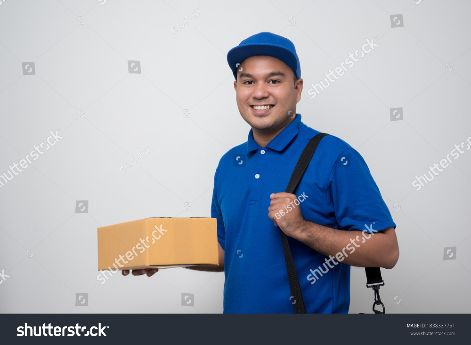 Young Smiling Asian Delivery Man Blue Stock Photo 1838337751 