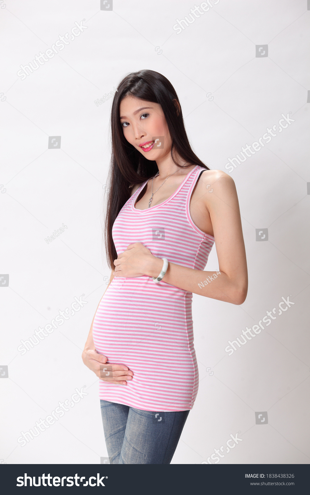 six-months-pregnant-on-white-background-stock-photo-1838438326-shutterstock