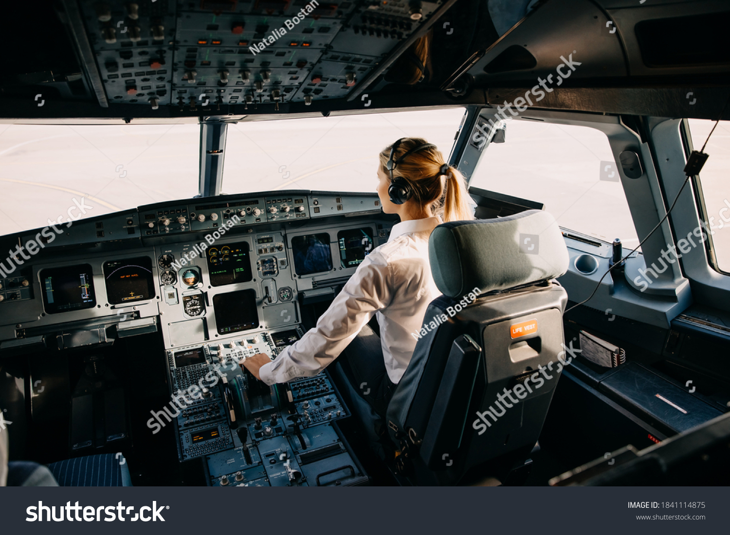 Woman Pilot Sitting Aircraft Cockpit Flying Stock Photo 1841114875 ...