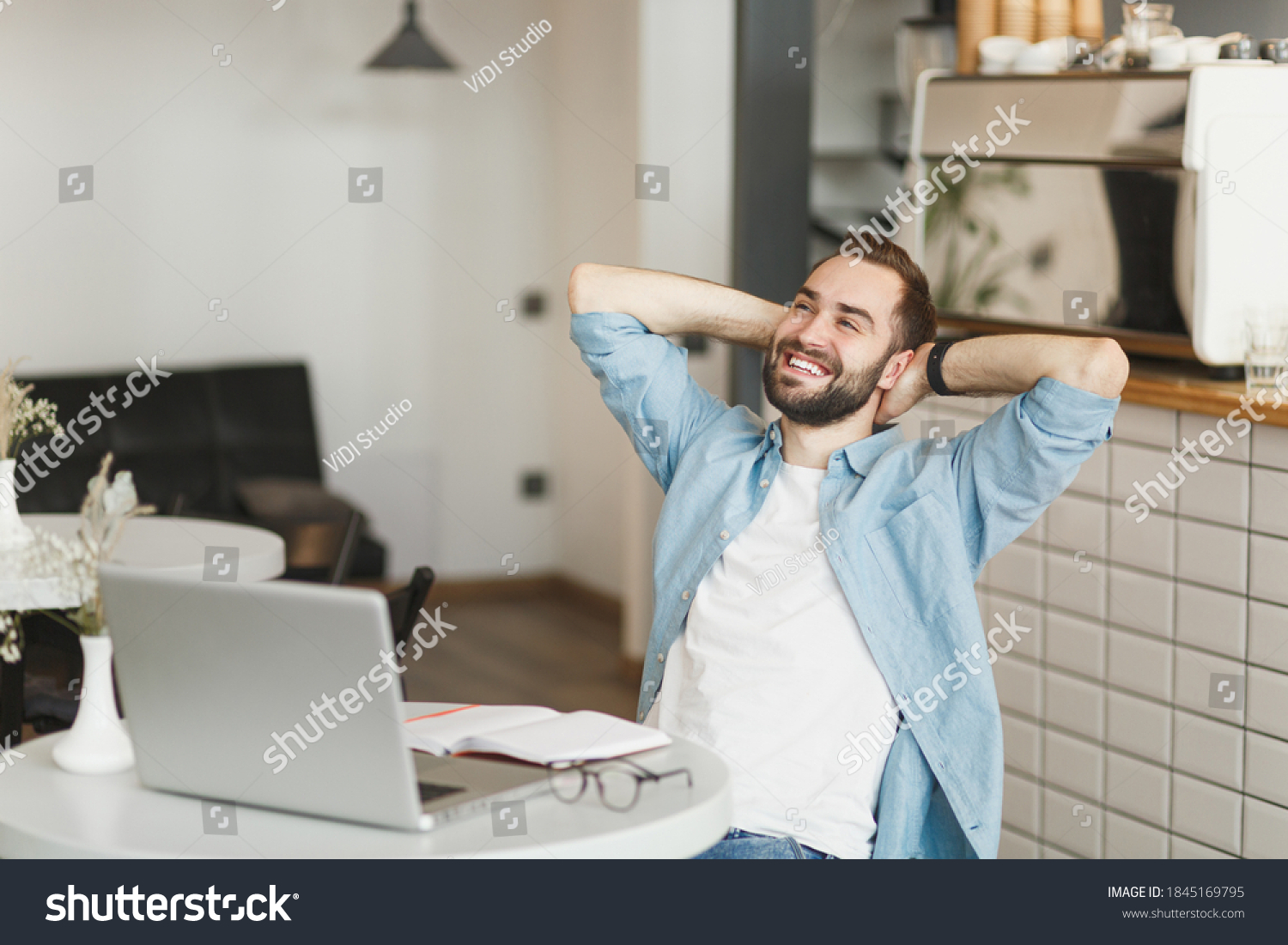 Smiling Young Man Sitting Alone Table Stock Photo 1845169795 | Shutterstock