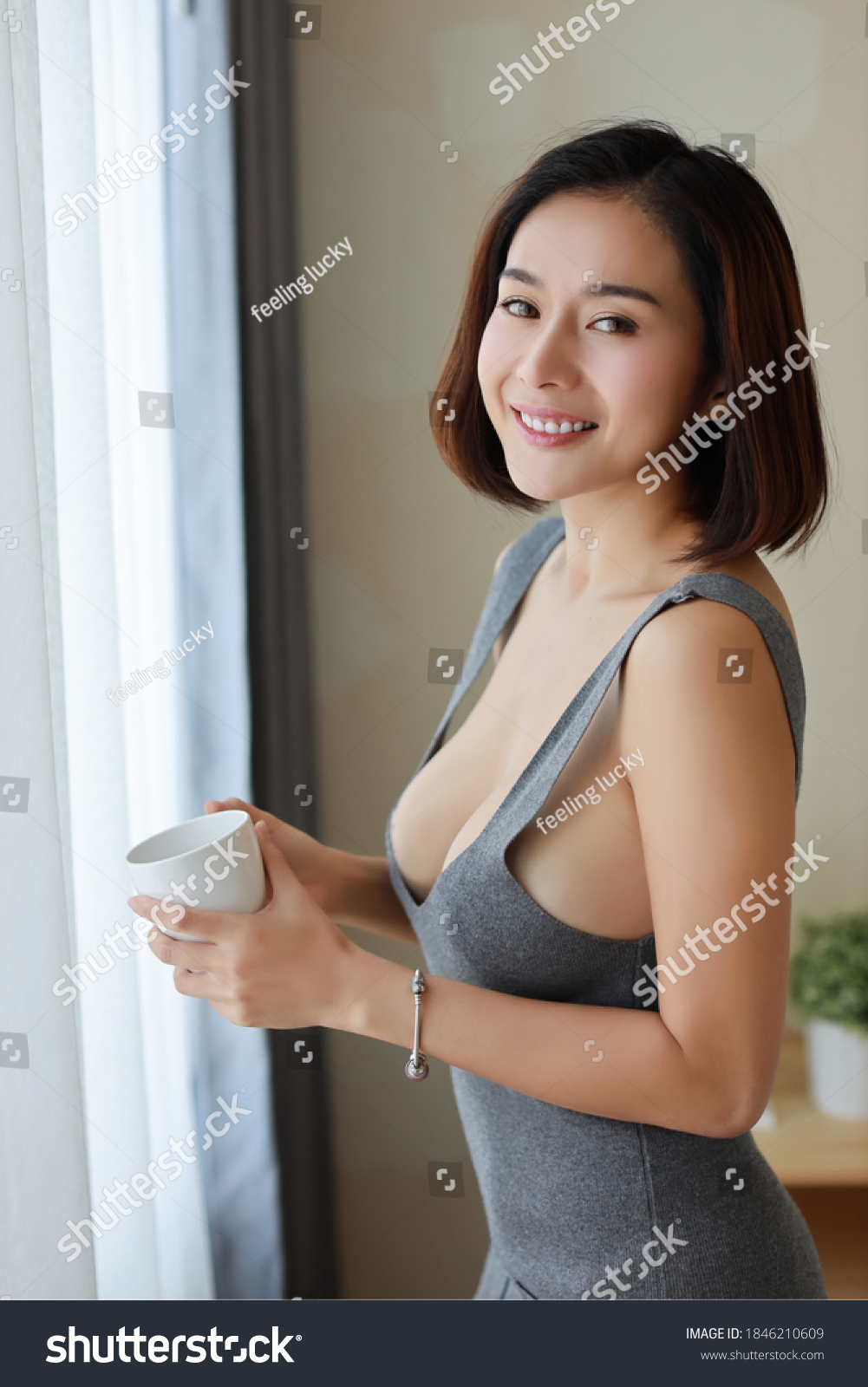 Full Length Stunning Asian Housewife picture