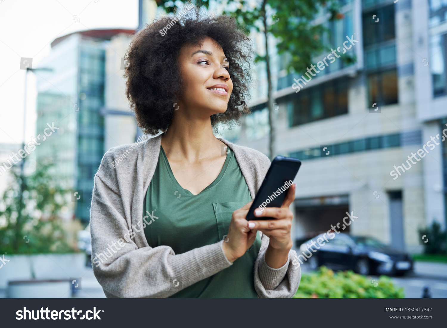 African Woman Looking Around While Holding Stock Photo 1850417842 ...