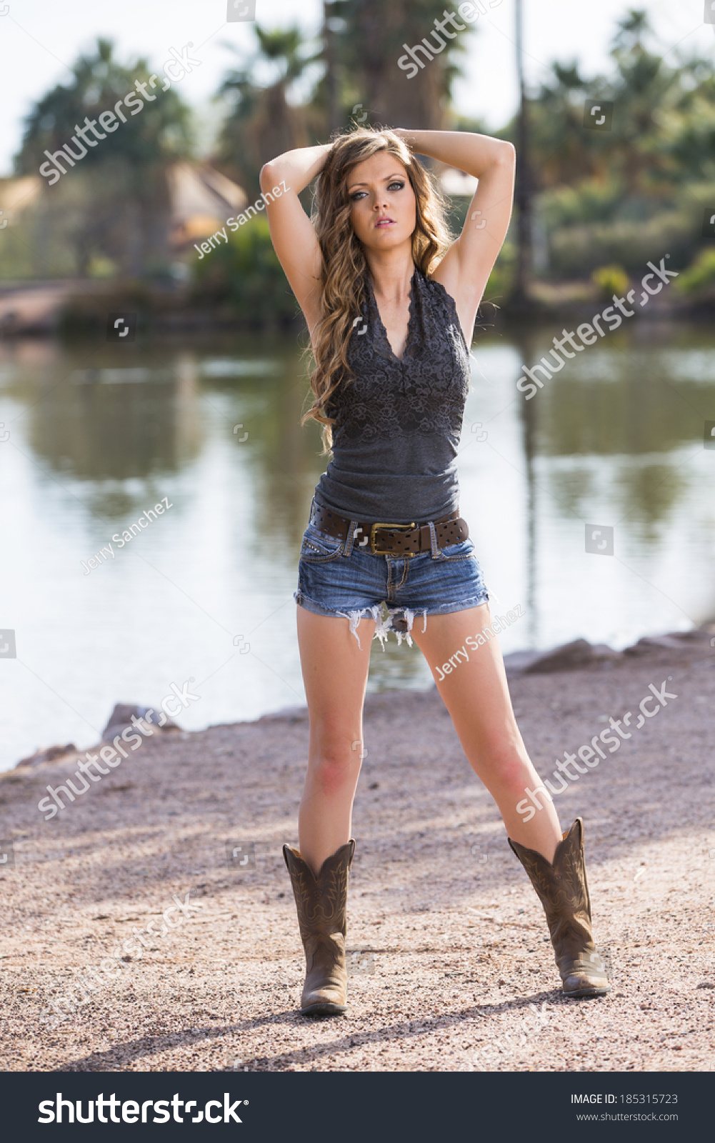 cowgirl boots and jean shorts