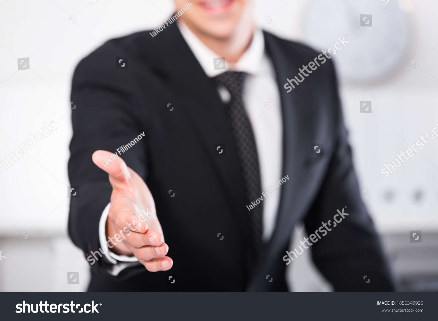 Businessman Stretching Open Hand Offering Handshake Stock Photo ...