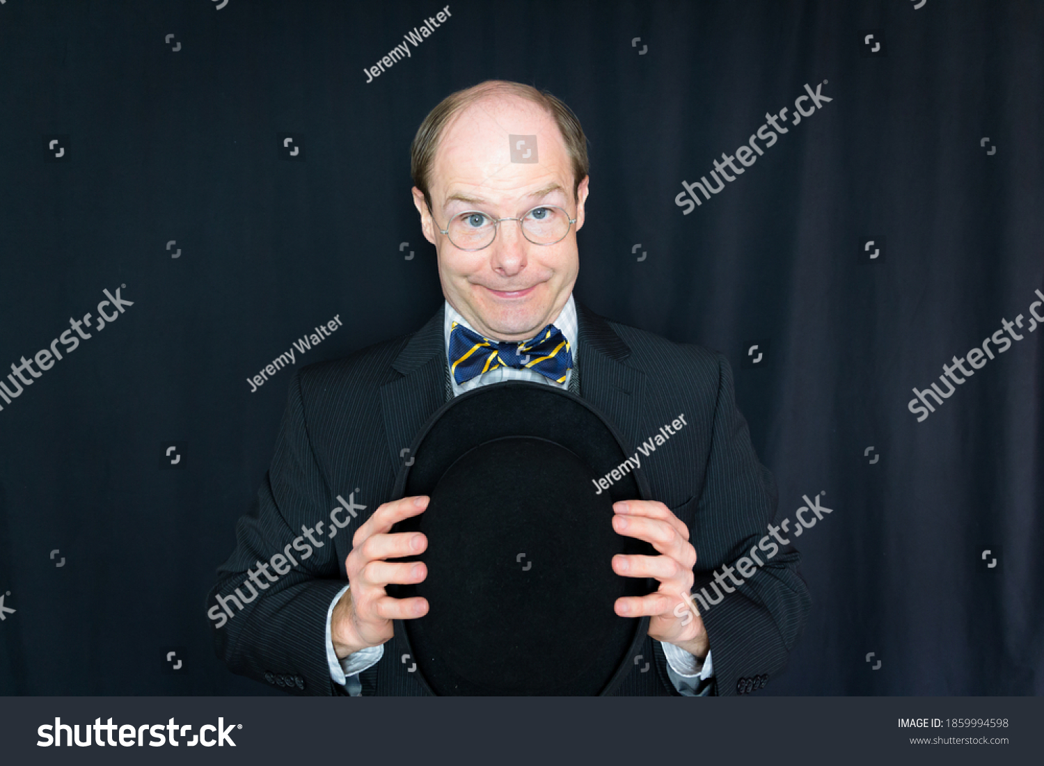 Portrait Man Dark Suit Holding Bowler Stock Photo 1859994598 | Shutterstock