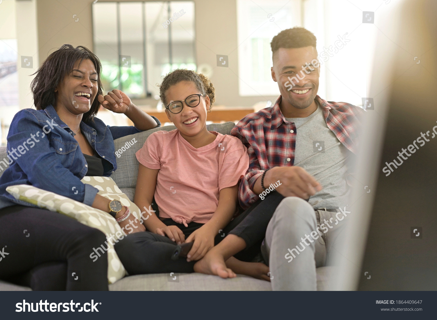 Happy Family Sitting Sofa Watching Tv Stock Photo 1864409647 Shutterstock   Stock Photo Happy Family Sitting In Sofa And Watching Tv Together 1864409647 