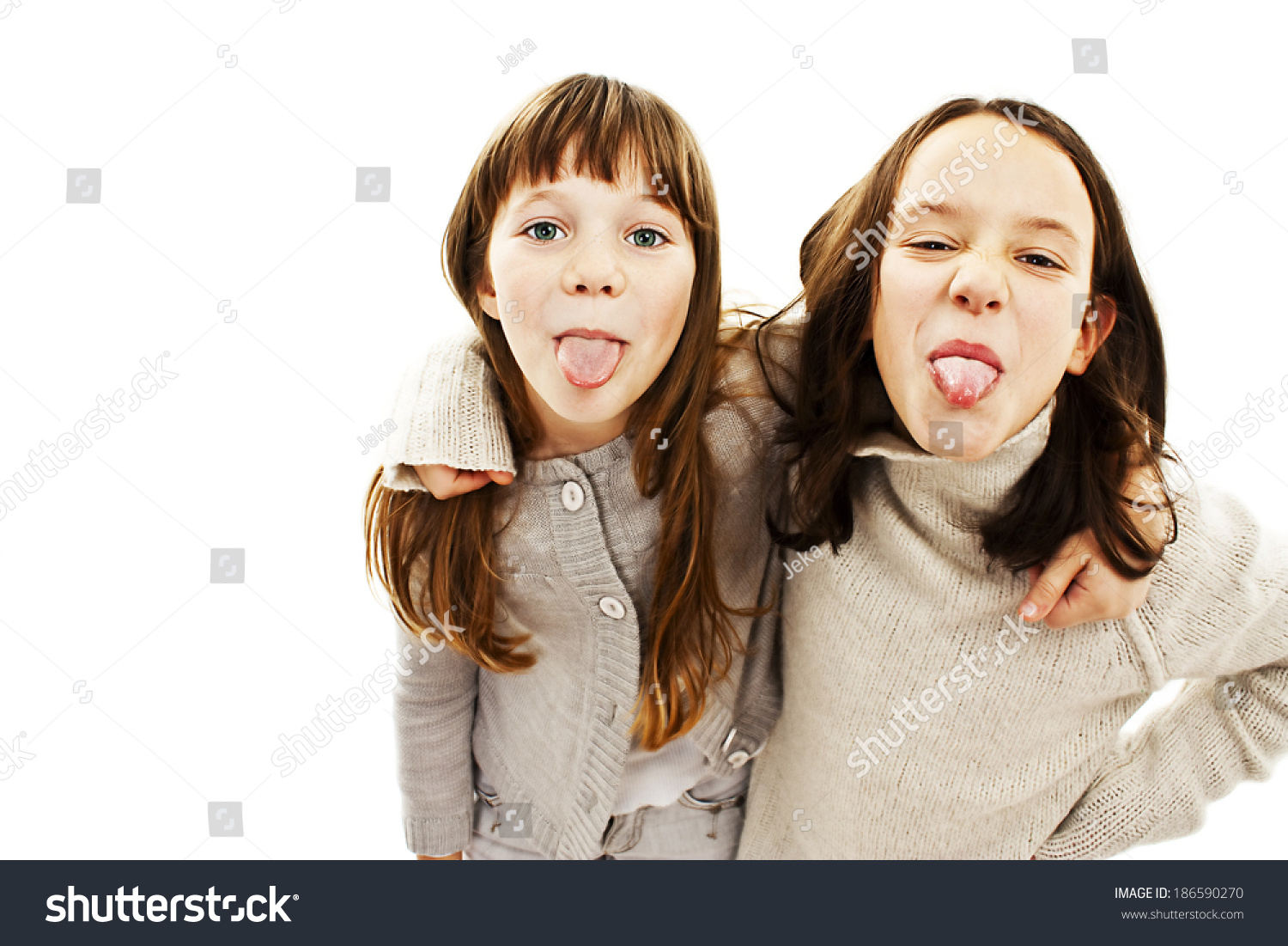 Two Girls Showing Their Tongues Isolated库存照片186590270 Shutterstock