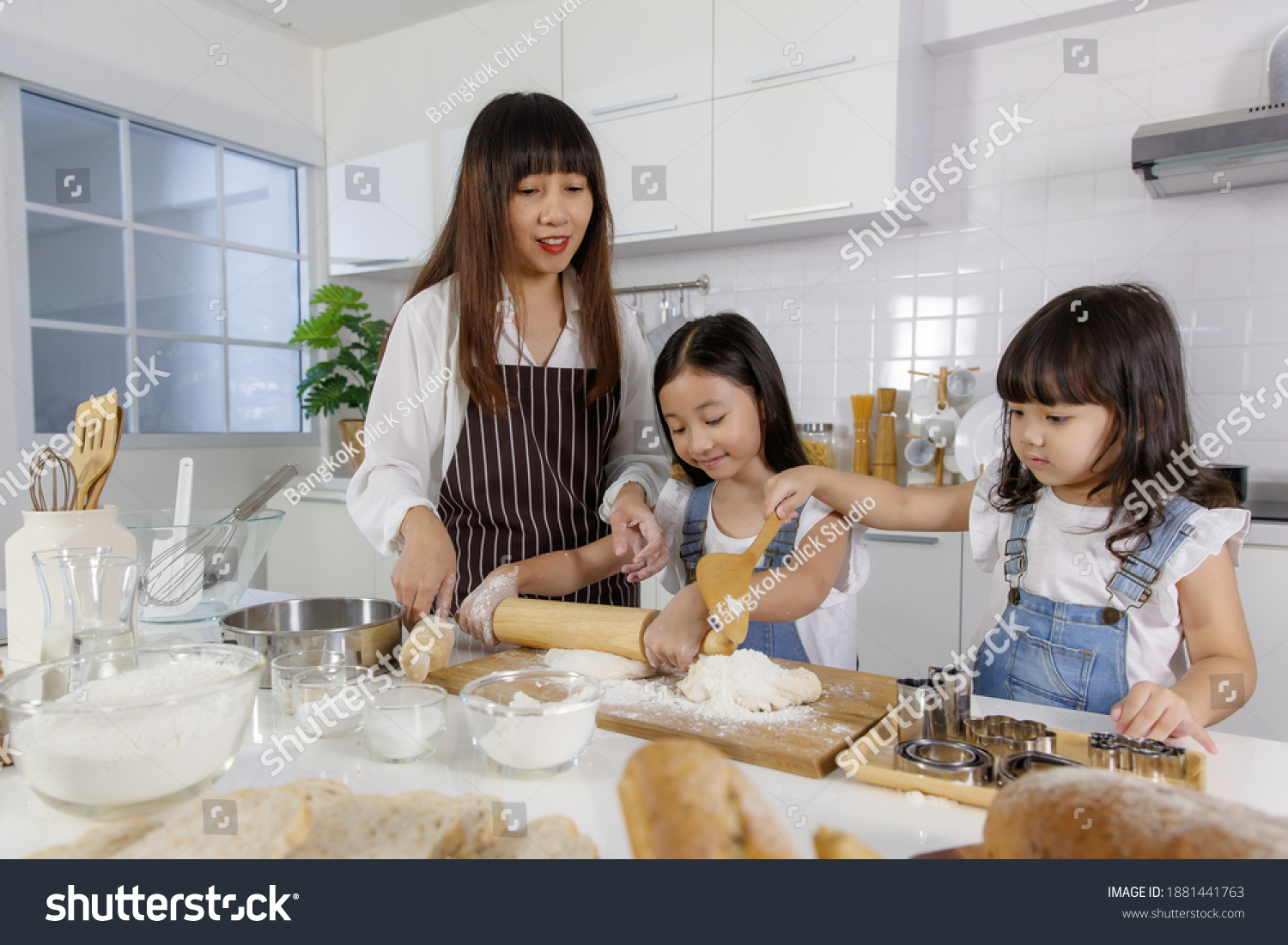 Beautiful Asian Mother Teaching Two Young Stock Photo 1881441763 ...