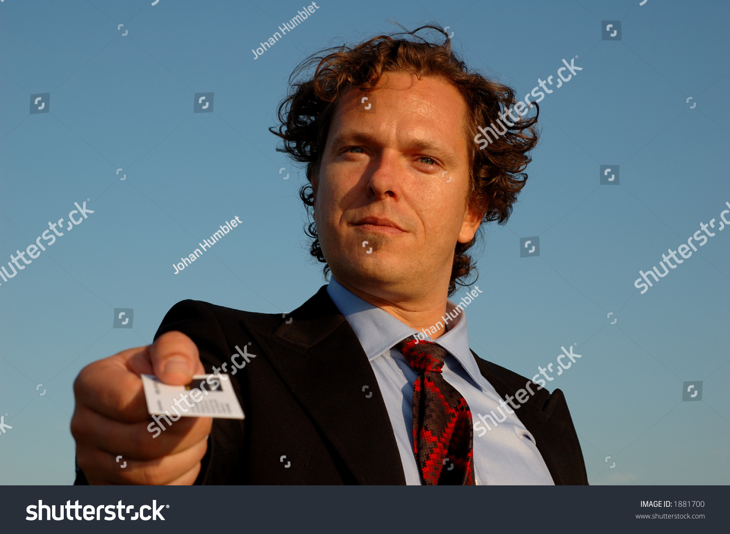 closeup-good-looking-guy-black-suit-stock-photo-1881700-shutterstock