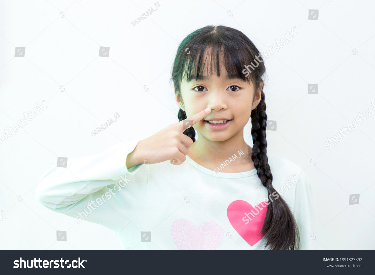 Asian Girl Pointing Her Face Stock Photo 1891823392 | Shutterstock