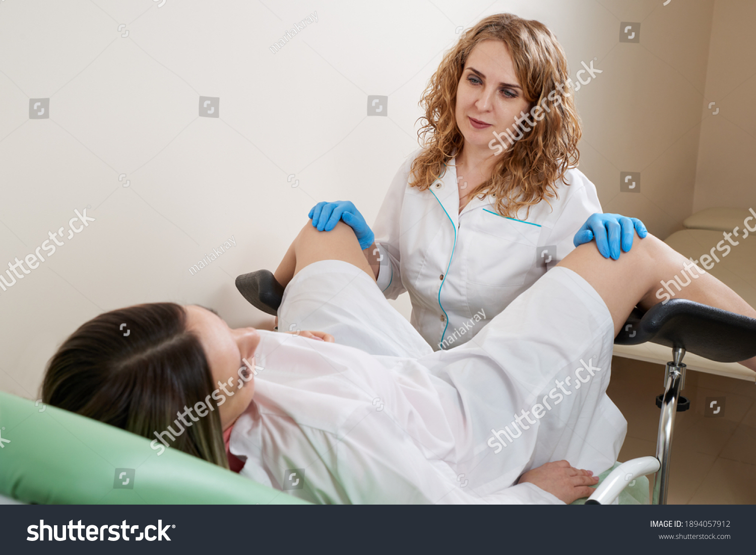 Gynaecologist Examining Patient Sitting On Gynecological Stock Photo ...