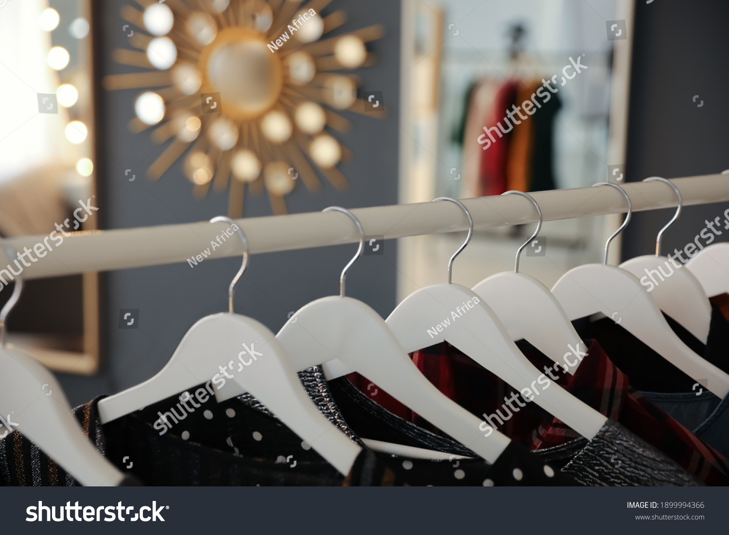 Collection Modern Clothes Hanging On Rack Stock Photo 1899994366 ...