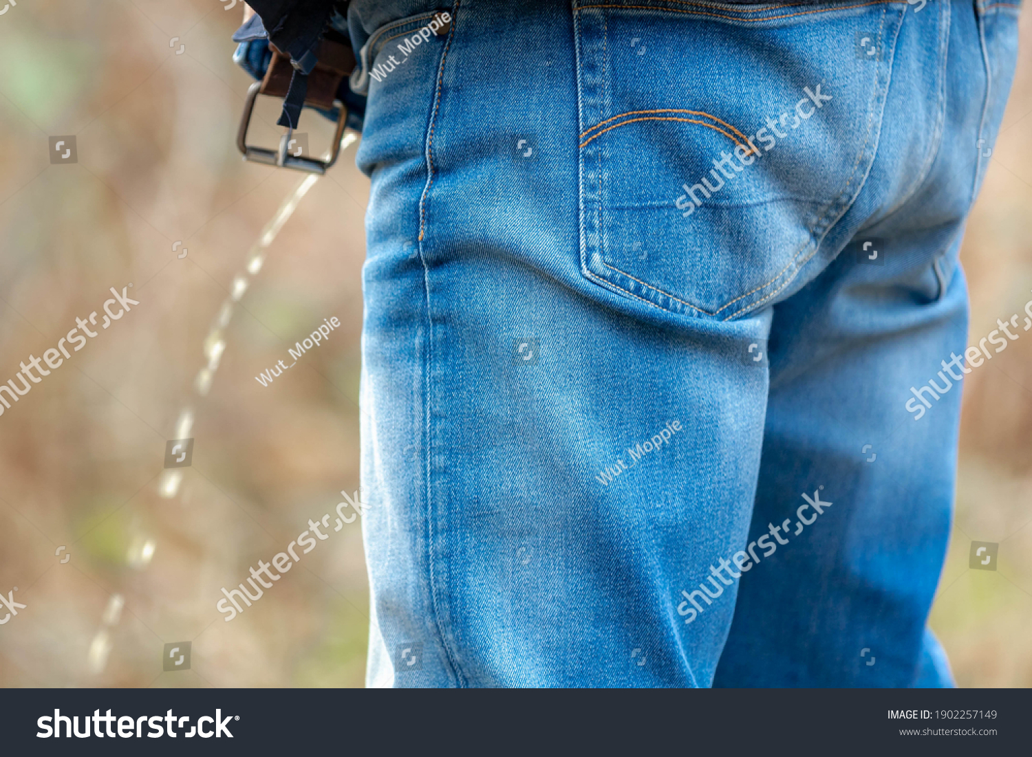 Man Peeing Jeans