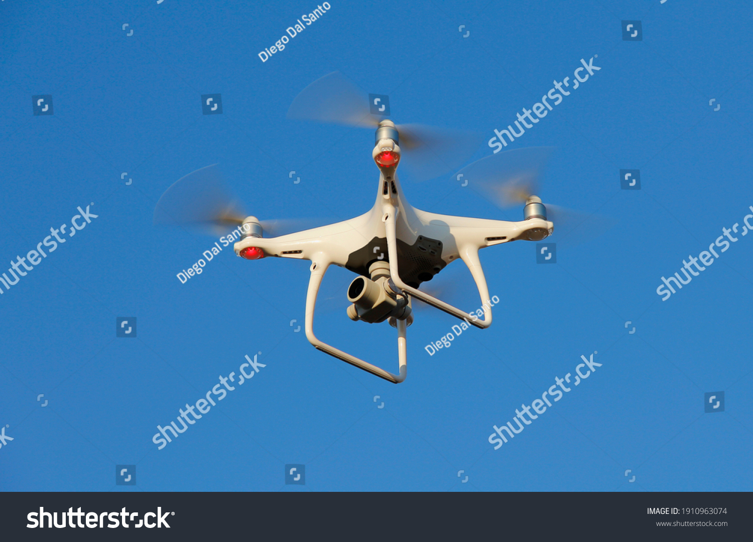 Image Hovering Drone Blue Sky Background Stock Photo 1910963074 ...