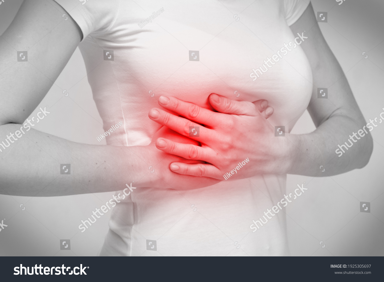 person-woman-feels-pain-under-breasts-stock-photo-1925305697-shutterstock