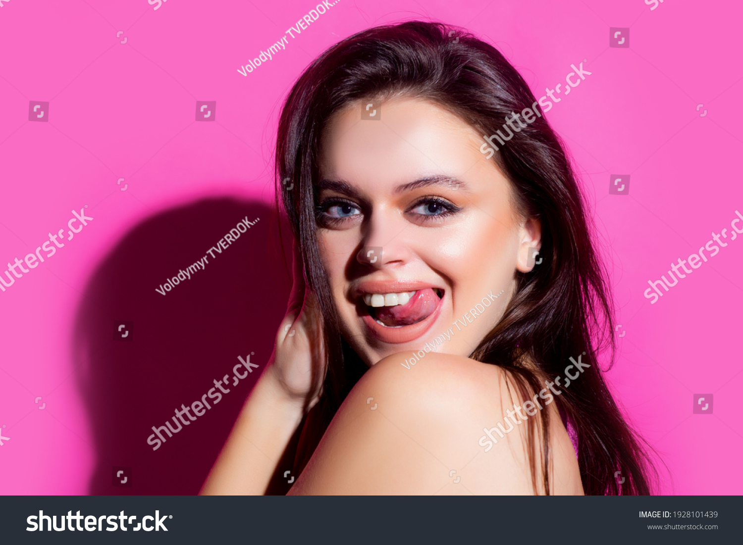Стоковая фотография 1928101439 Sexy Girl Showing Tongue Woman Emotions