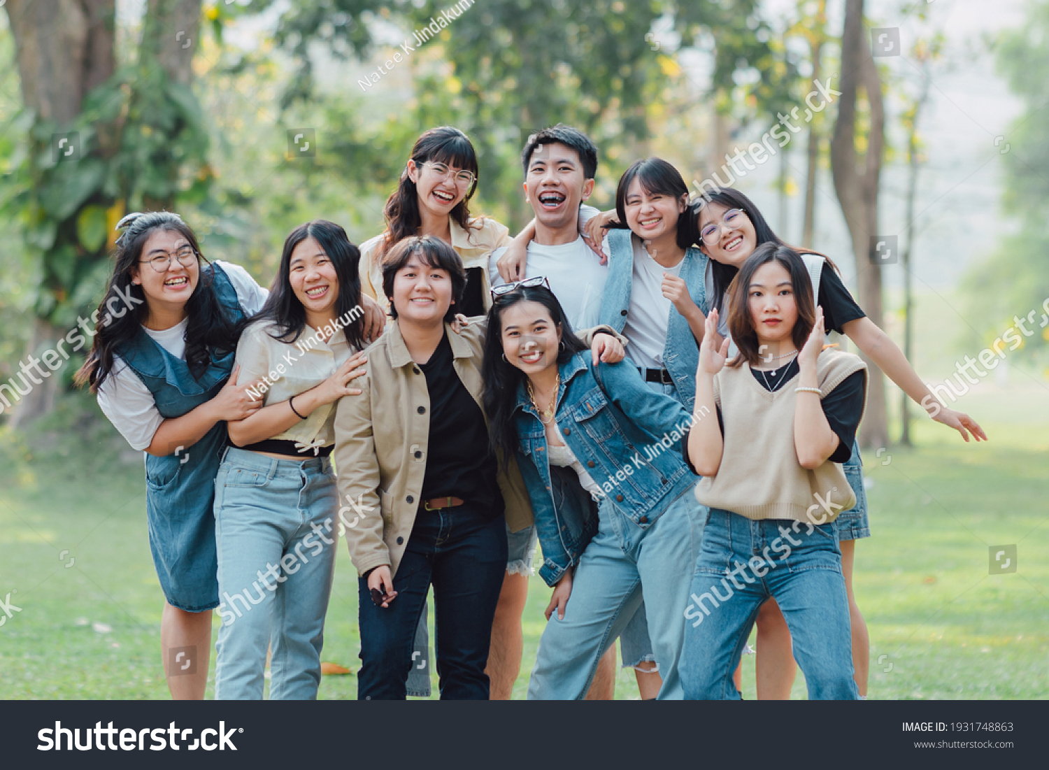 groups-friends-embrace-each-other-together-stock-photo-1931748863