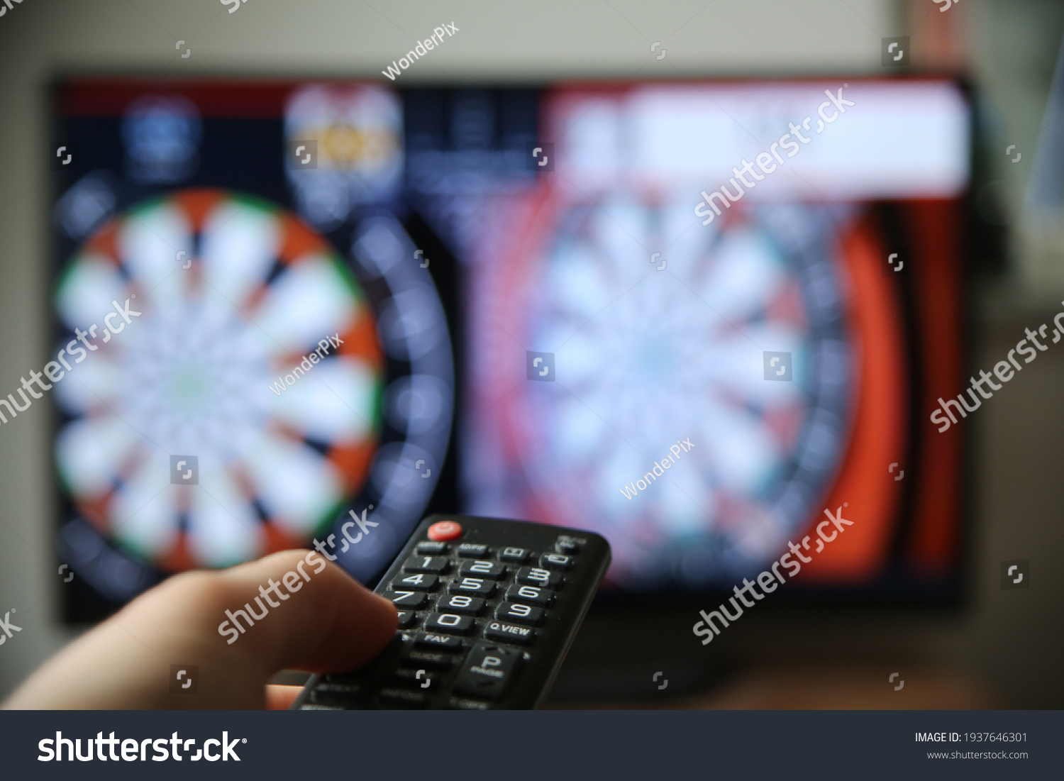 Watching Dart On Tv Finger On Stock Photo 1937646301 Shutterstock