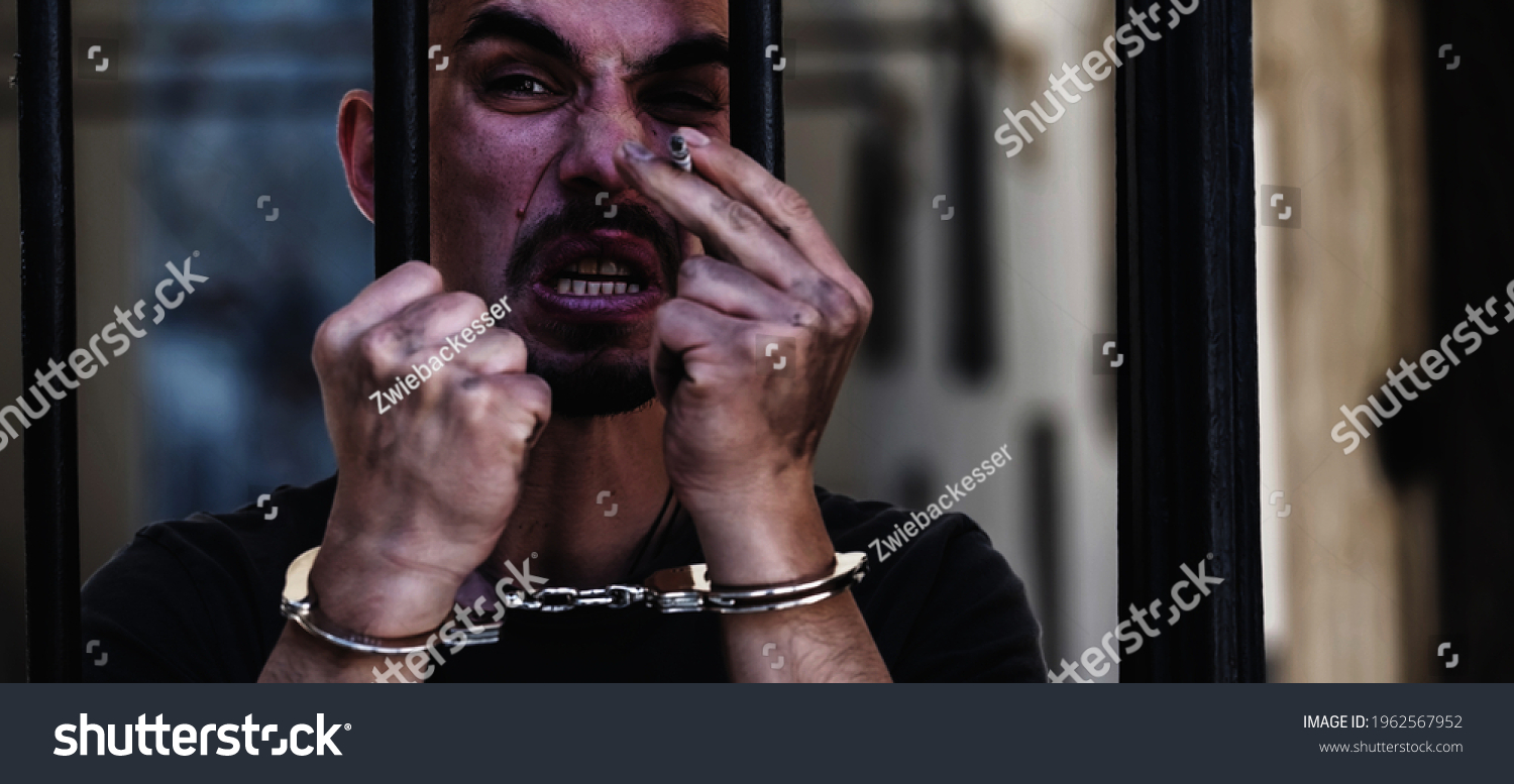 Handcuffed Man Smoking Cigarette Imprisoned Crime Stock Photo ...