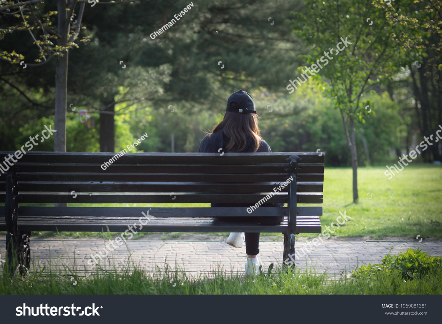 Sad Woman Sitting On Bench Image