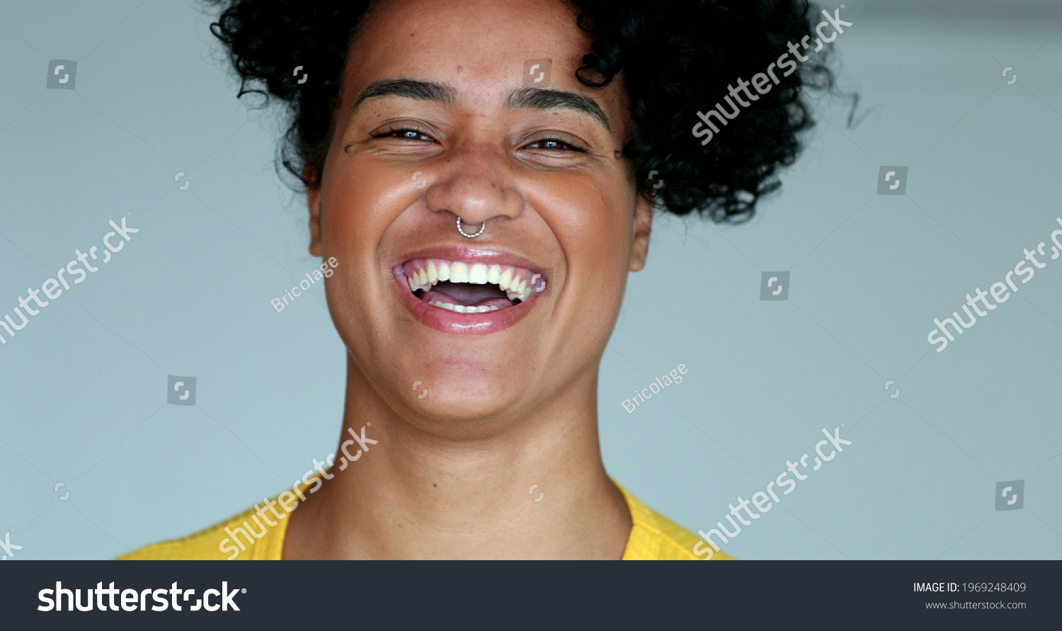 Young Black Woman Bursting Laughing Out Stock Photo 1969248409 ...