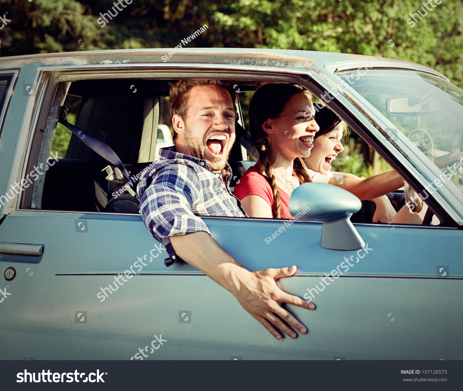 Car Three Adults Laughing Driving Stock Photo 197126573 | Shutterstock