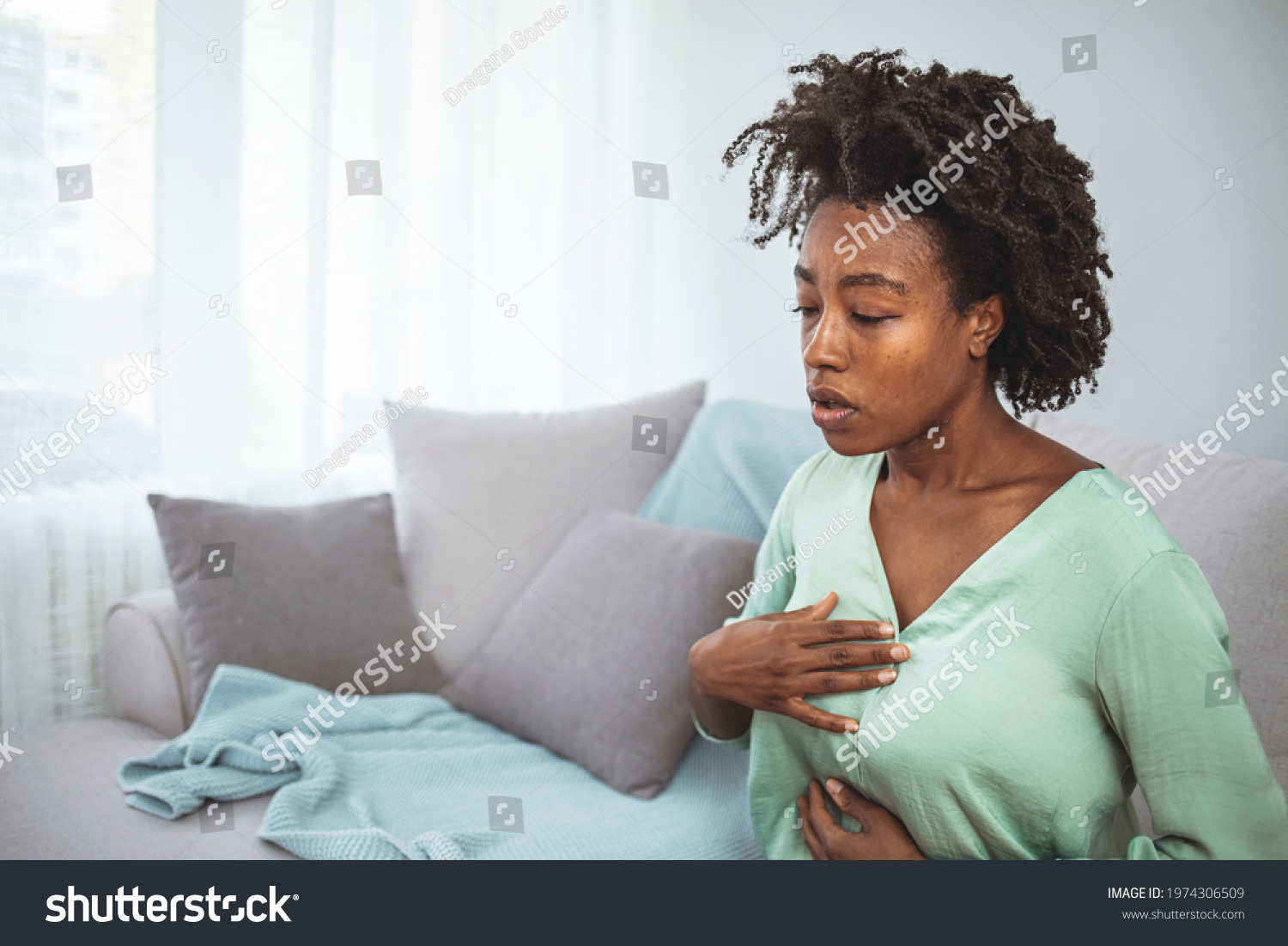 pressure-chest-closeup-stressed-woman-who-stock-photo-1974306509