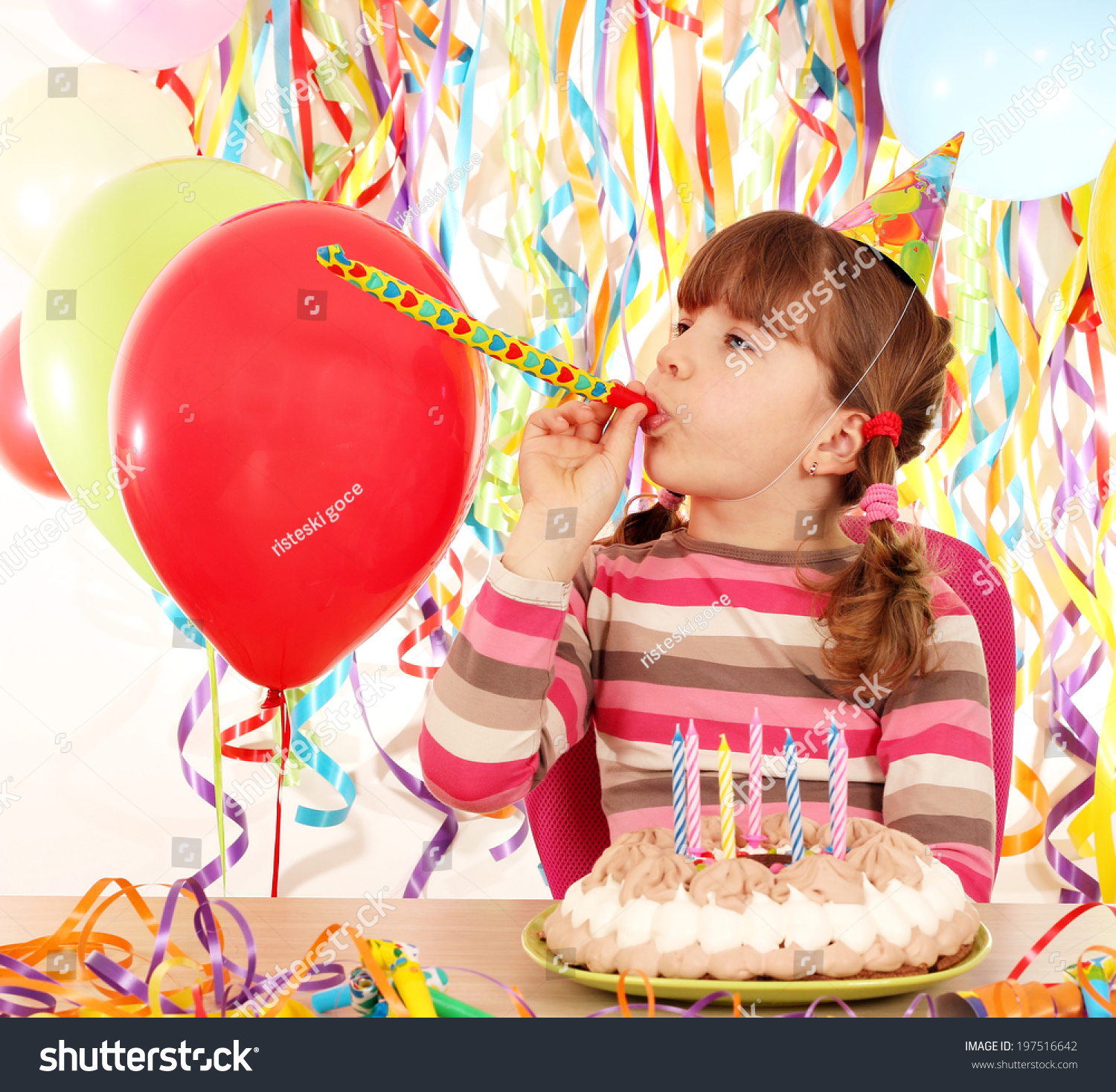 happy-little-girl-birthday-cake-stock-photo-197516642-shutterstock