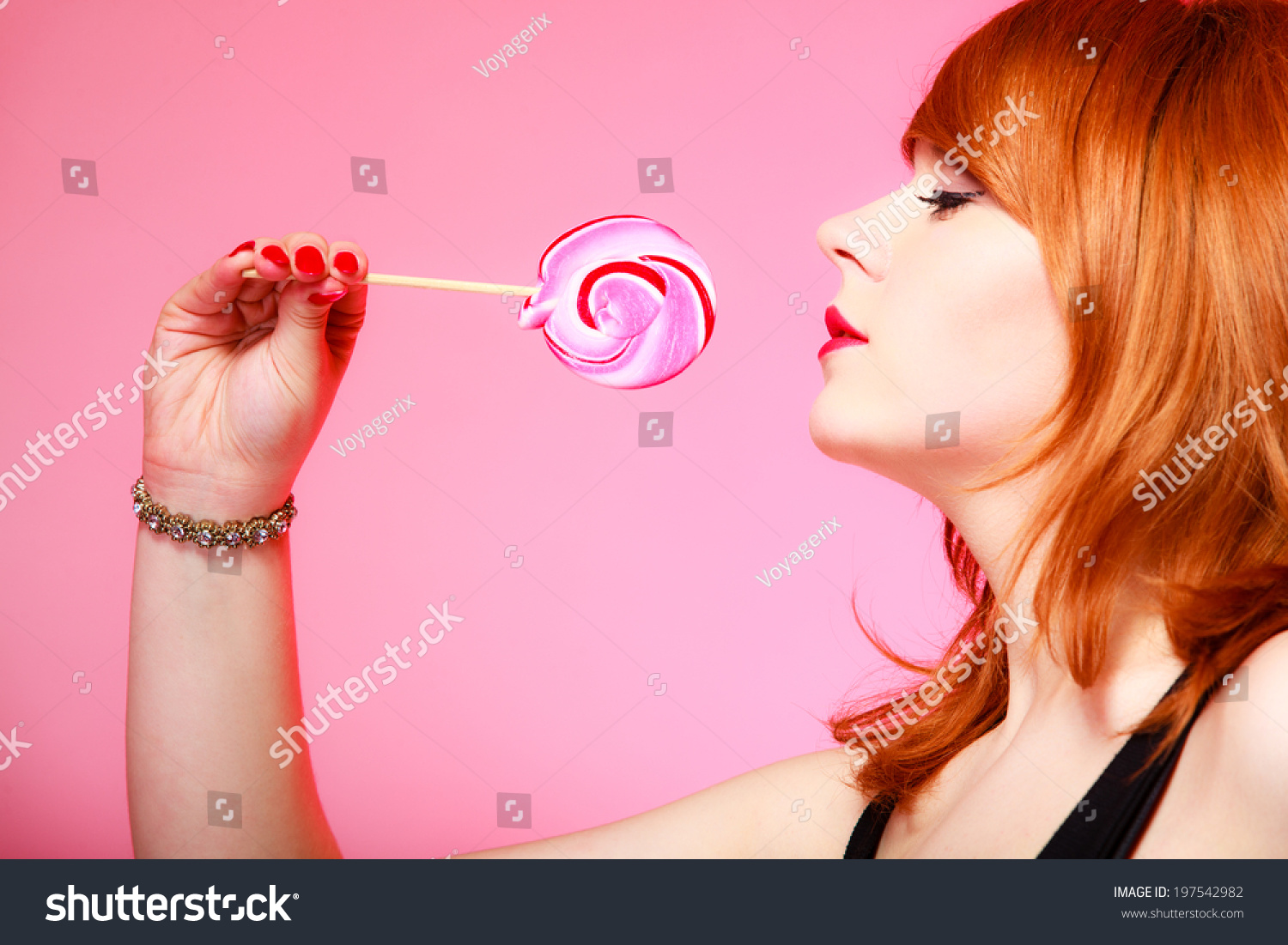 Sexy Young Woman Holding Candy Redhair Stock Photo 197542982 Shutterstock