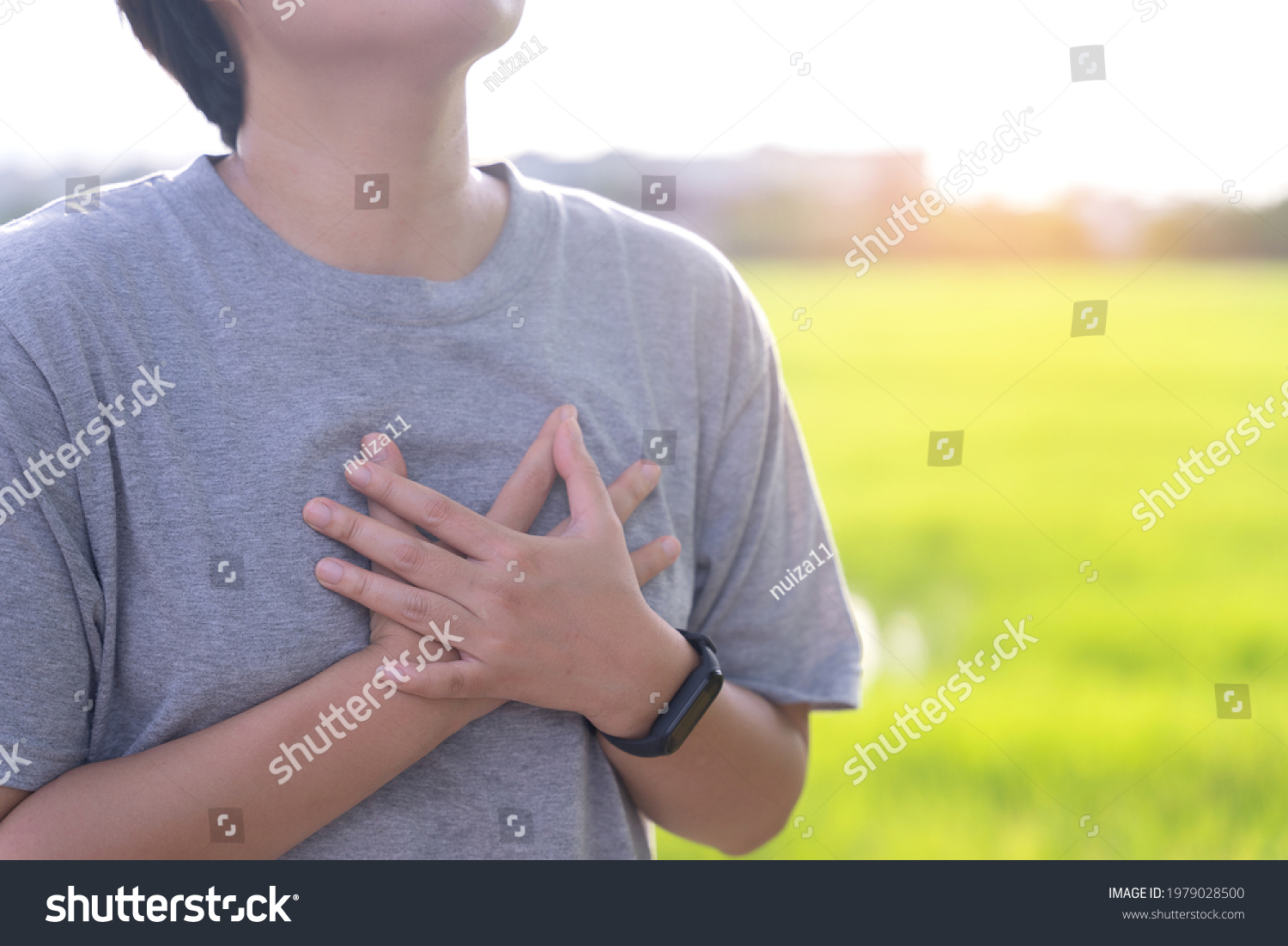 woman-have-chest-pain-while-running-stock-photo-1979028500-shutterstock