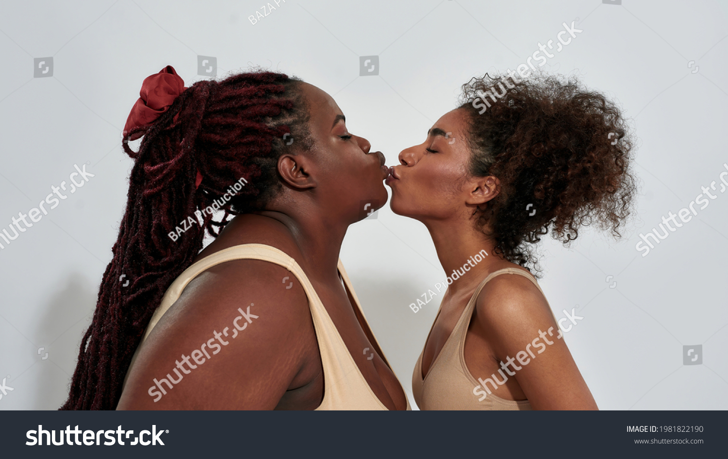 Ebony and whote spit kissing