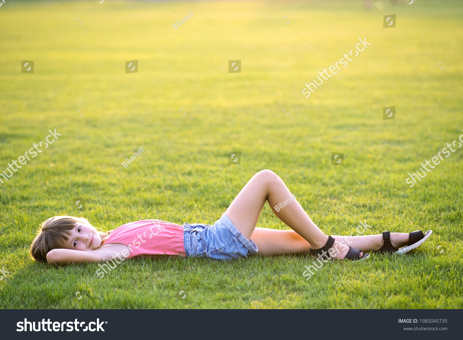 Young Pretty Child Girl Laying Down Stock Photo 1985045735 | Shutterstock