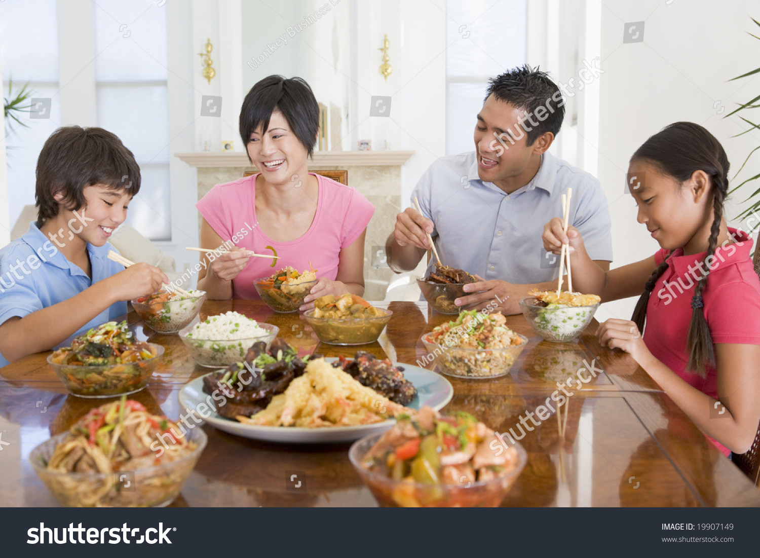 Family Enjoying Mealmealtime Together Stock Photo 19907149 | Shutterstock