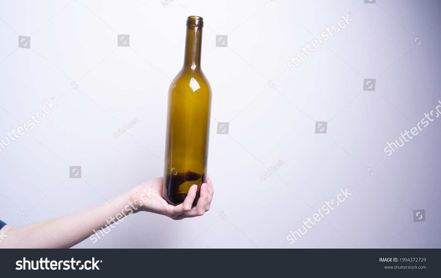 Womans Hand Holding Glass Bottle Stock Photo 1994372729 