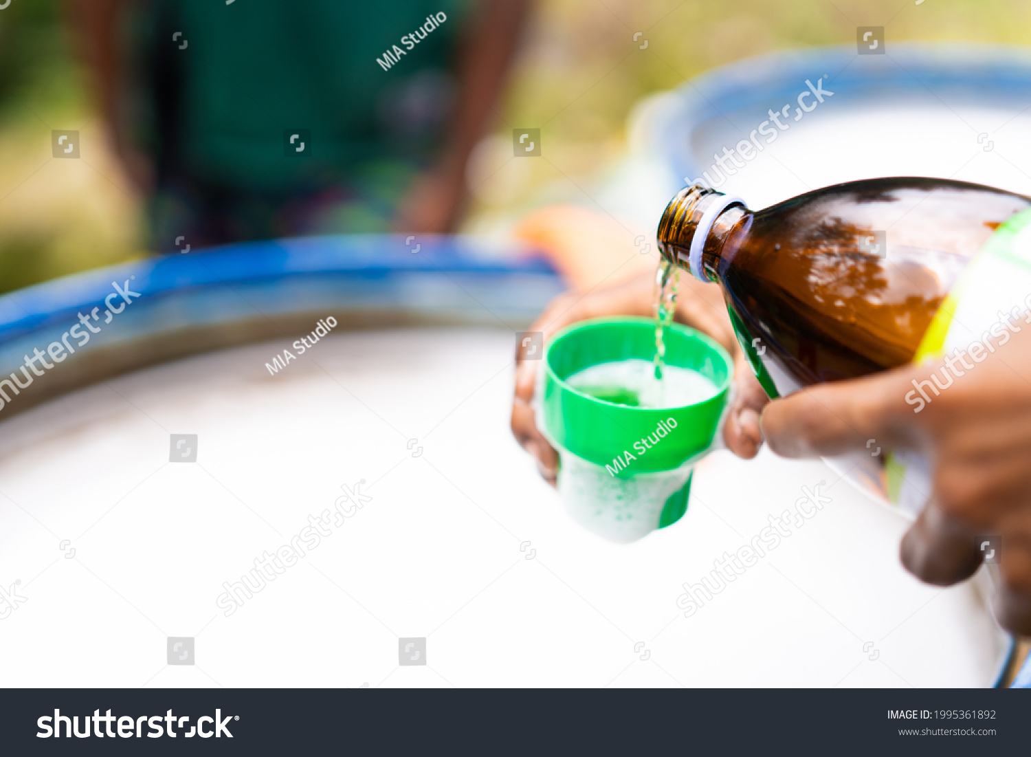 Farmer Hand Pouring Chemical Insecticide Liquid Stock Photo 1995361892 ...