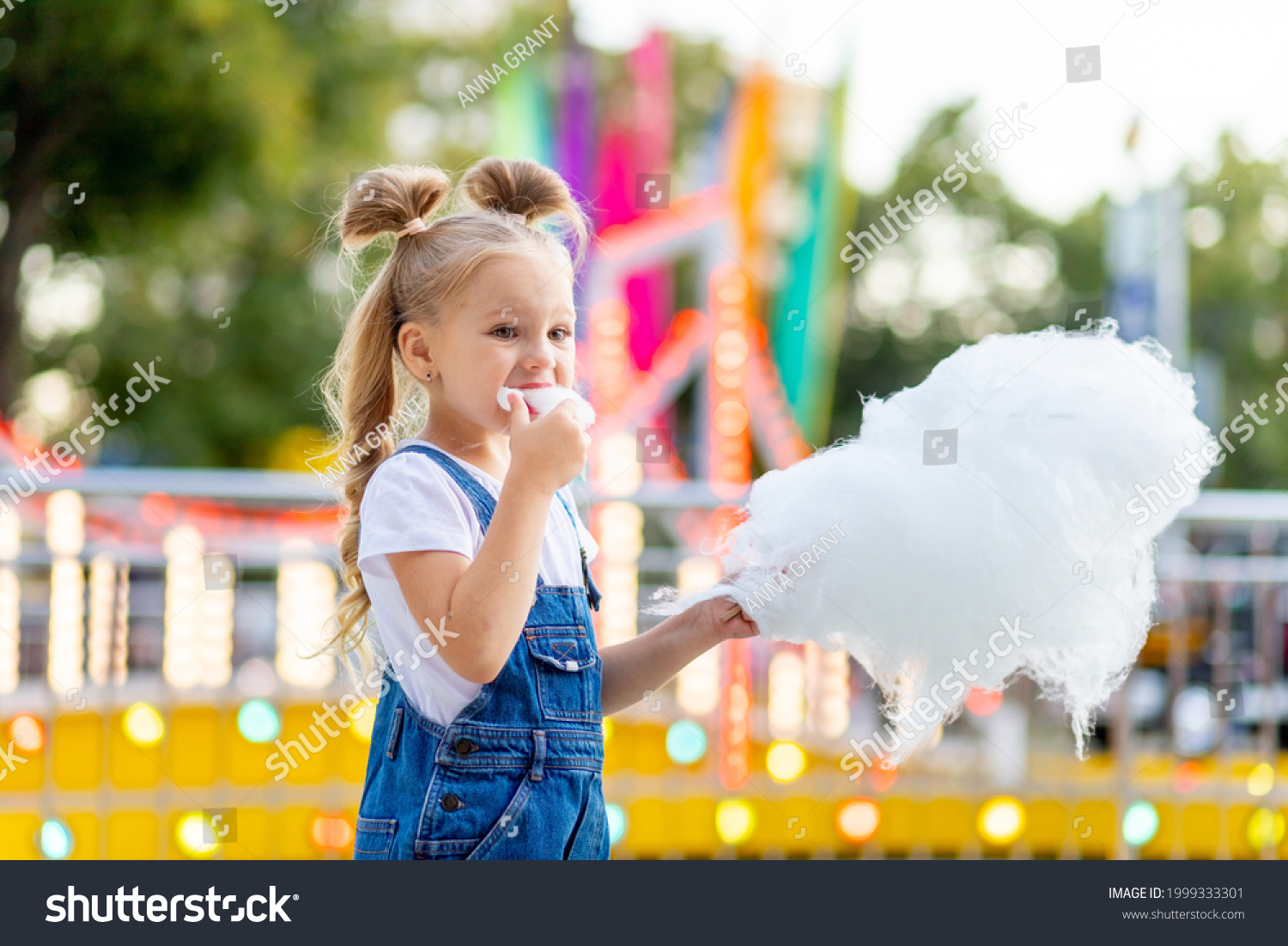 Happy Baby Girl Eating Cotton Candy Stock Photo 1999333301 | Shutterstock