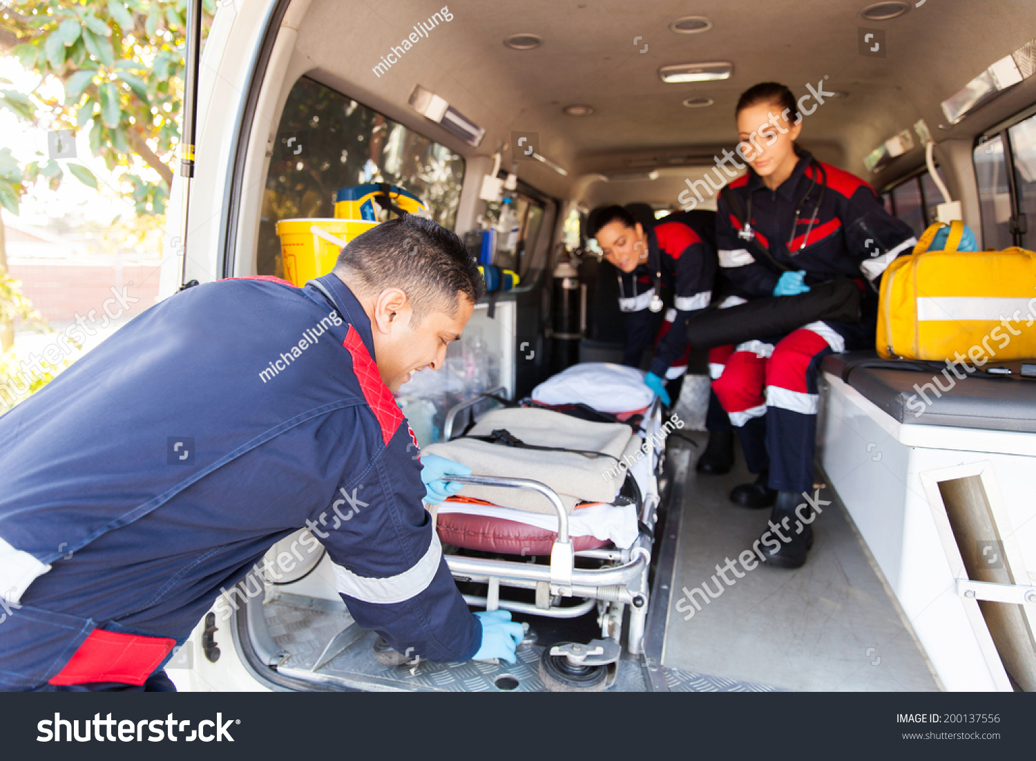 Team Paramedics Taking Stretcher Out Ambulance Stock Photo 200137556 ...