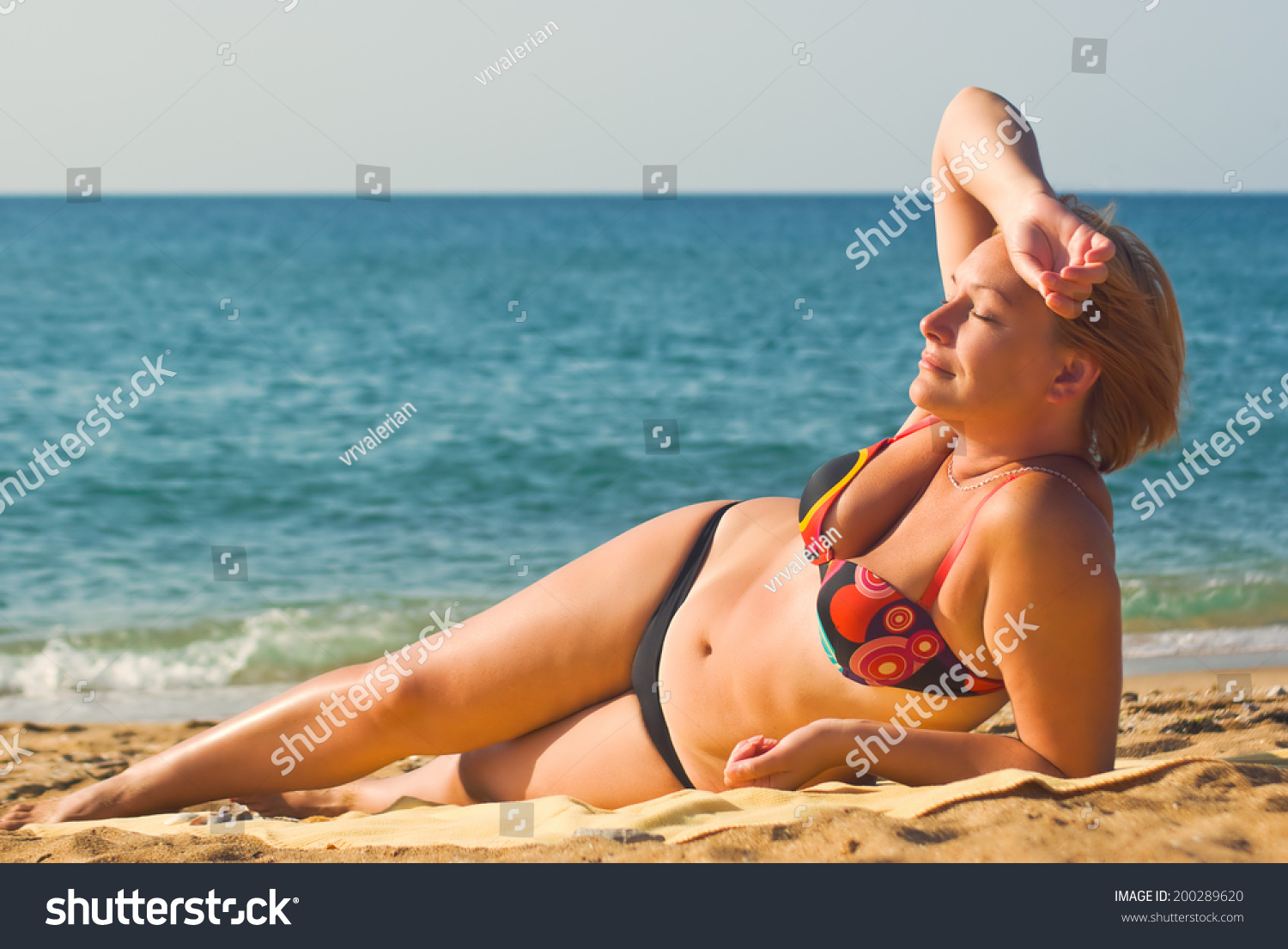Confident Happy mature woman Beach vacation picture