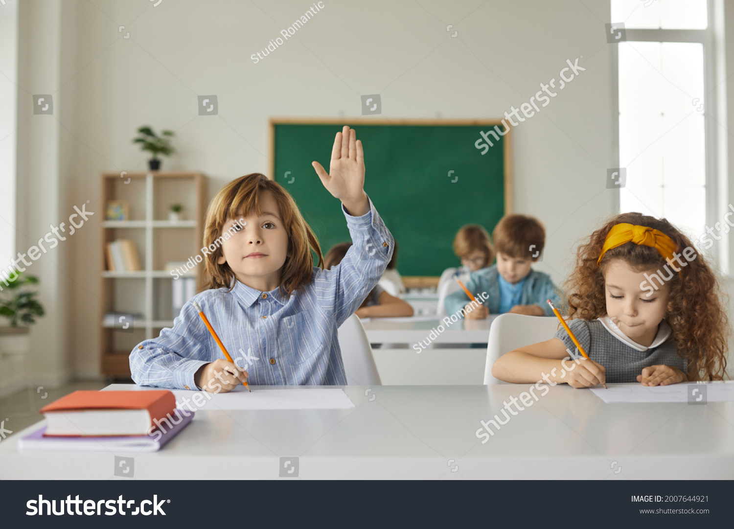 Boy Girl Sitting School Desk Writing Stock Photo 2007644921 | Shutterstock