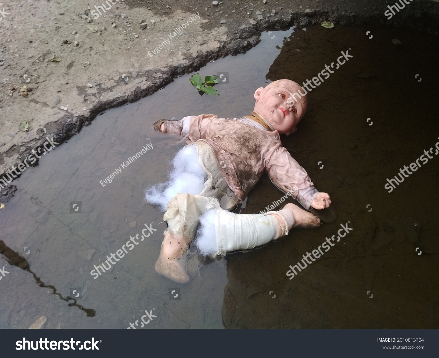 Torn Broken Baby Doll Puddle Stock Photo 2010813704 | Shutterstock