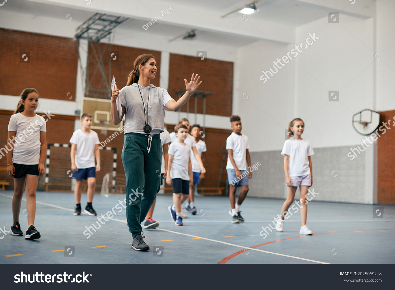 Happy Physical Education Teacher Talking Her Stock Photo 2025069218 ...