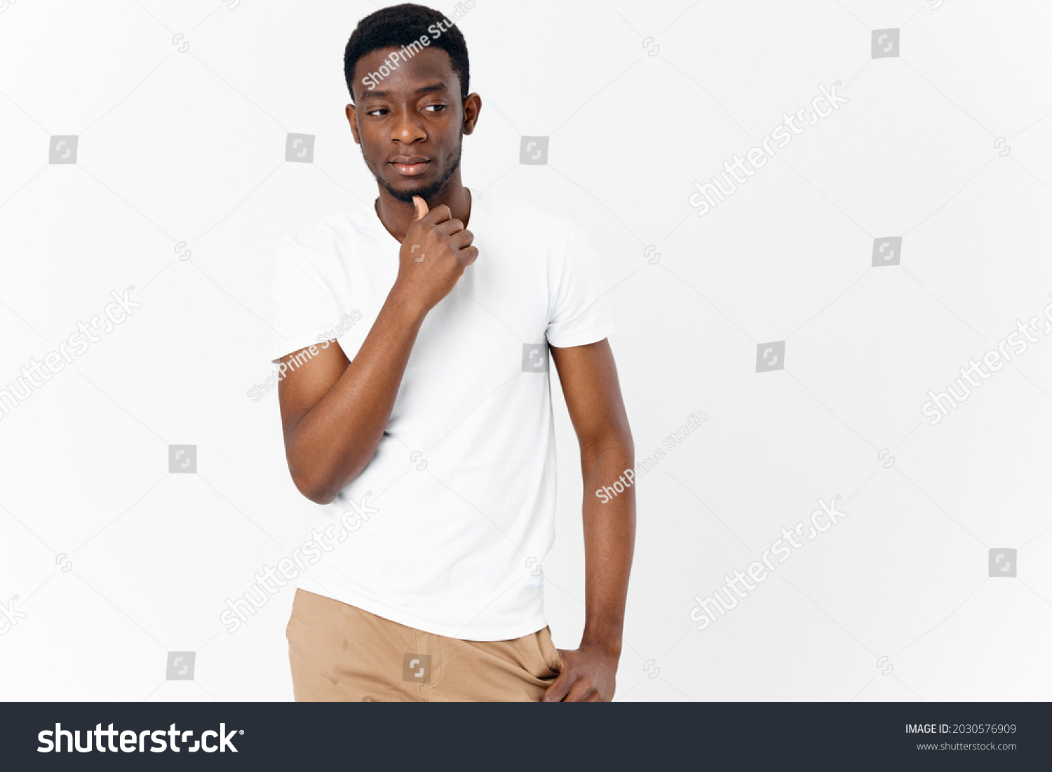 Man African Appearance White Tshirt Holds Stock Photo 2030576909 ...